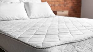 Freshly steam-cleaned mattress with a pristine, spotless surface, highlighting the effectiveness of professional cleaning in removing dirt, stains, and allergens.